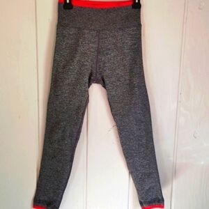 LIKE NEW!! ATHLETA, Heather Gray W/Red Trim Highrise Andes Seamless Leggings.